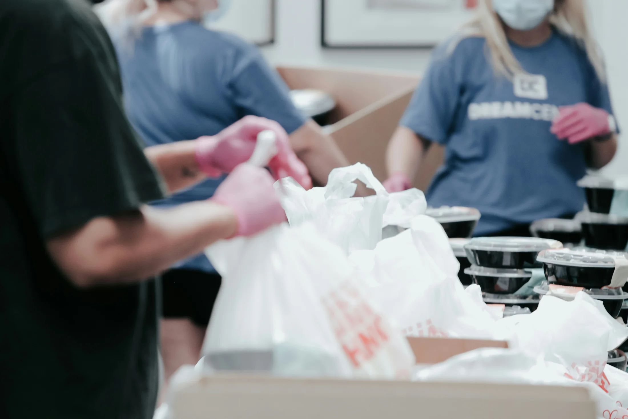 Volunteers preparing supplies for their community